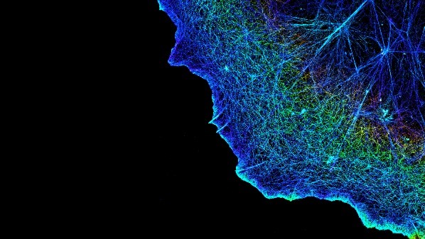 A blue cloudlike structure containing glowing blue threads.