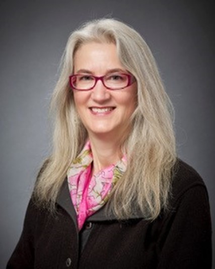 A headshot of Dr. Alexandra Adams.